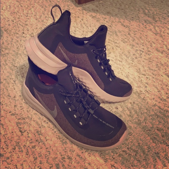 nike renew rival shield women's water resistant running shoes